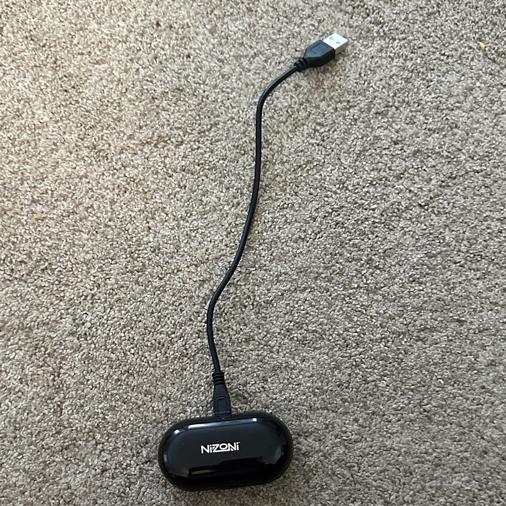 Nizoni Black Wireless Earbuds with Charging Cable used
